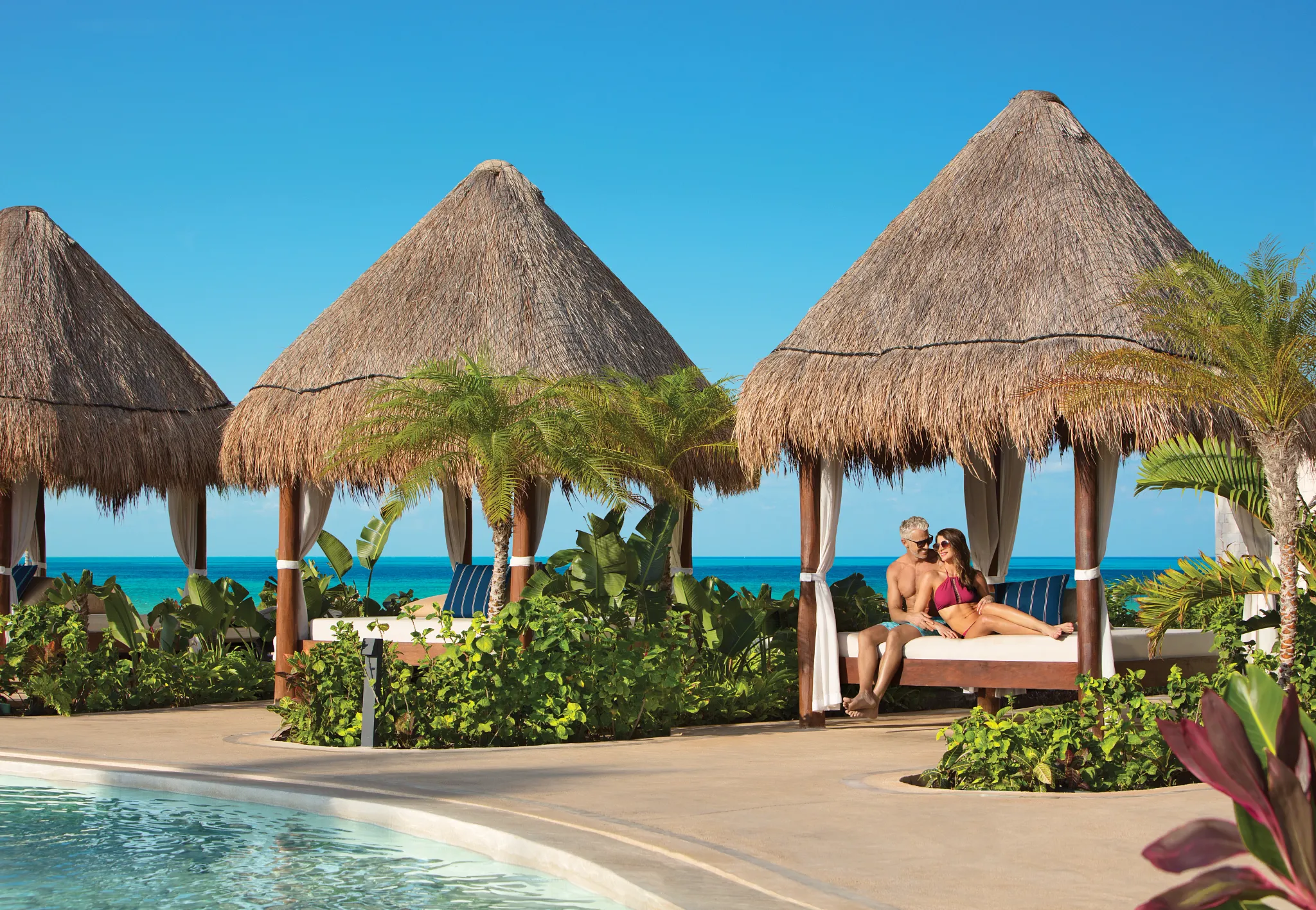 Beach cabanas and loungers at the resort